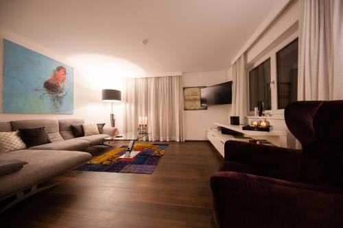 TV a/nebo společenská místnost v ubytování da Peatala Apartments
