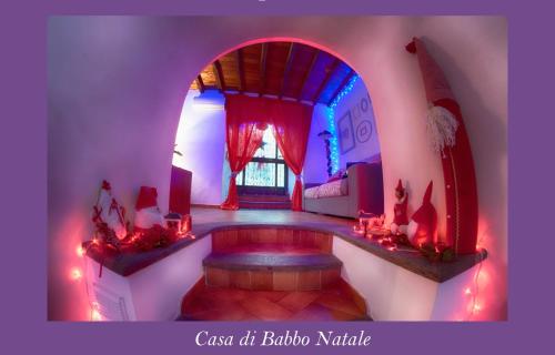 a room with a hot tub with red lights at Il Rosciolo Sulla Francigena in Formello