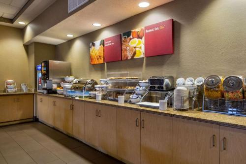 a buffet line in a restaurant with food at Comfort Suites Near Gettysburg Battlefield Visitor Center in Gettysburg