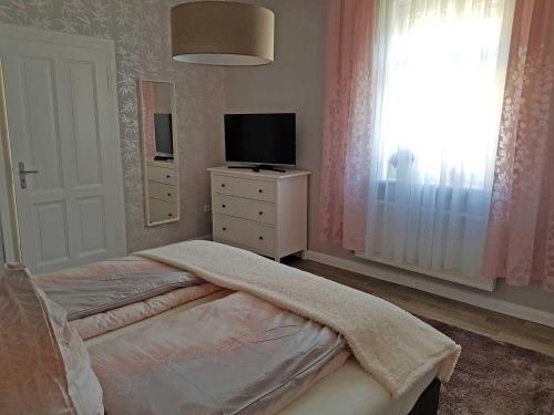 Ένα ή περισσότερα κρεβάτια σε δωμάτιο στο Mia Casa