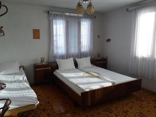 Postel nebo postele na pokoji v ubytování Guest House AHP