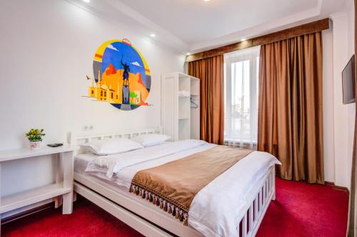 Katil atau katil-katil dalam bilik di WHITE HOTEL & HOSTEL