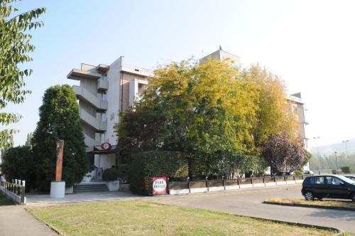 a car parked in front of a building at Park Hotel in Castrocaro Terme