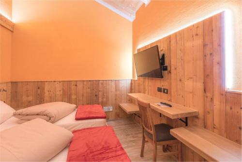 Ένα ή περισσότερα κρεβάτια σε δωμάτιο στο Agriturismo La Poina