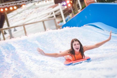 a woman in an inflatable at The Kartrite Resort and Indoor Waterpark in Monticello