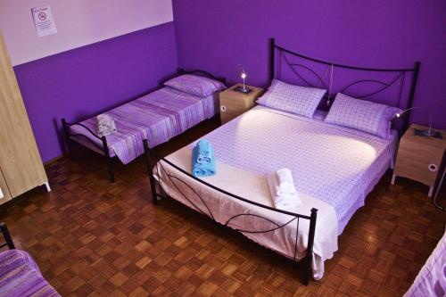 Säng eller sängar i ett rum på B&B La Luce - Casa di Ale