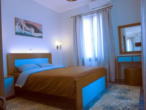 Ένα ή περισσότερα κρεβάτια σε δωμάτιο στο Ktima Kiourelioti
