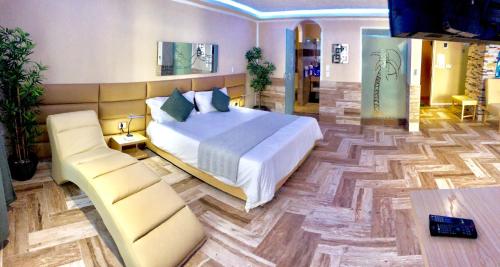 Postel nebo postele na pokoji v ubytování Sosua Inn Hotel