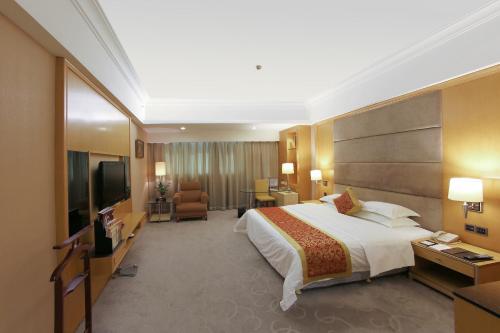 TV a/nebo společenská místnost v ubytování Gladden Hotel Jiangmen