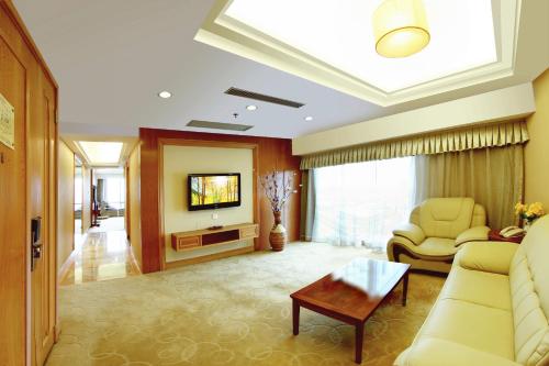 TV a/nebo společenská místnost v ubytování Gladden Hotel Jiangmen