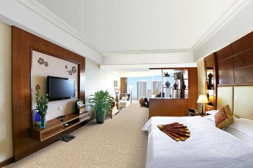 TV a/nebo společenská místnost v ubytování Gladden Hotel Jiangmen