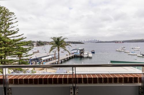 a view of a marina with boats in the water at Watsons Bay Boutique Hotel in Sydney