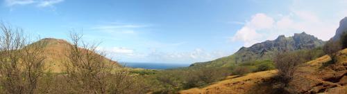 a view of the ocean from a mountain range at FARINHA DE PAU - ECO B&B in Tarrafal