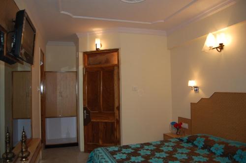 TV a/nebo společenská místnost v ubytování Hotel Prestige
