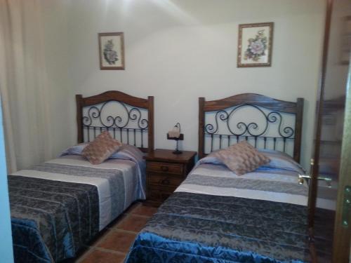 Postel nebo postele na pokoji v ubytování Cortijo Rural Los Gonzalez