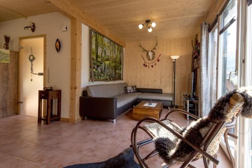 Un lugar para sentarse en Luxury Chalet Kreischberg 11a