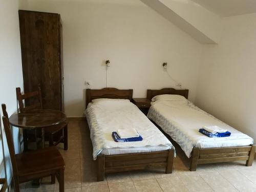 Un pat sau paturi într-o cameră la Casa Juliana