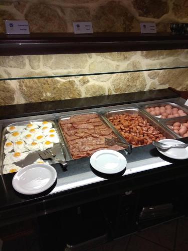 a buffet with many different types of food at Indigo Mare in Plataniás