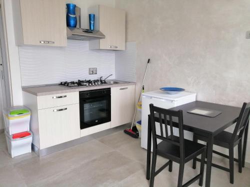 Kuchyň nebo kuchyňský kout v ubytování Bed and Breakfast Mezzanotte