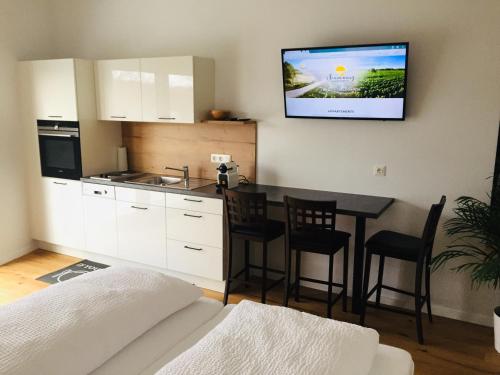 A kitchen or kitchenette at Sonnenweg Appartements