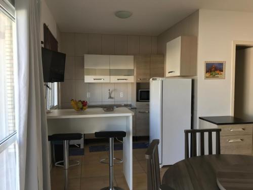 Η κουζίνα ή μικρή κουζίνα στο Apartamento Sunset 101