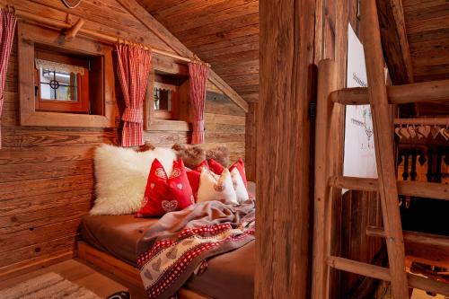 Un lugar para sentarse en Almdorf Flachau - Luxus Hüttenurlaub
