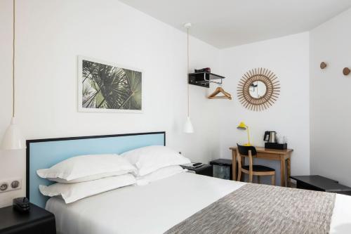 Ліжко або ліжка в номері Hotel Palm - Astotel