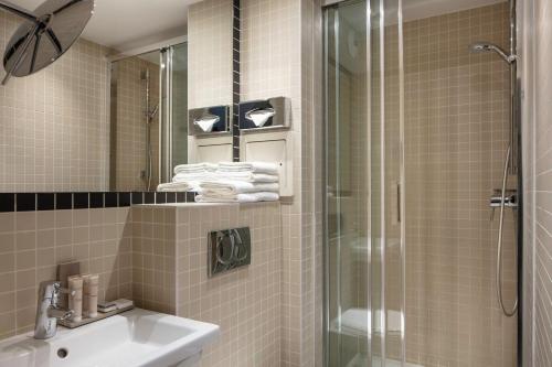 Ванна кімната в Hotel Palm - Astotel