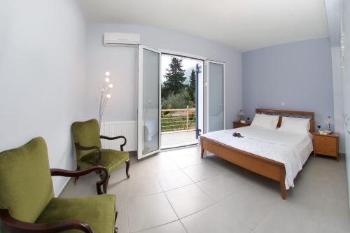 Giường trong phòng chung tại Anatoli Villa