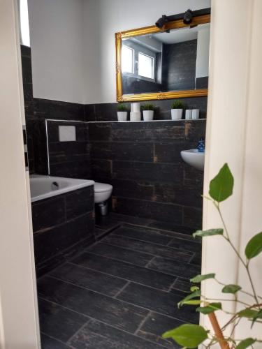 Ванная комната в Ferienhaus Fräulein Frenz