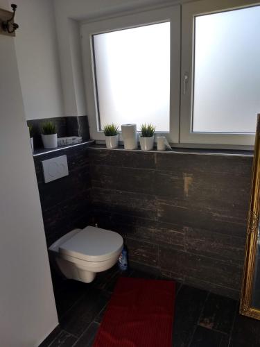 Ванная комната в Ferienhaus Fräulein Frenz