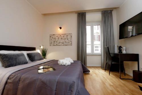 A bed or beds in a room at Termini Terrace