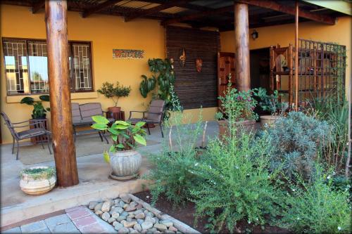 Κήπος έξω από το Aqua Terra Guest House