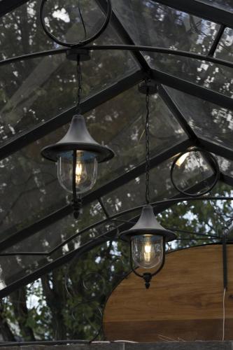 a couple of lights hanging from a tent at TERRA PREMIUM Hostal Boutique in Quito