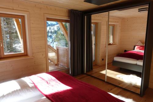 Posteľ alebo postele v izbe v ubytovaní Heidi Chalets Falkert Heidialm - Chalet Almsommer