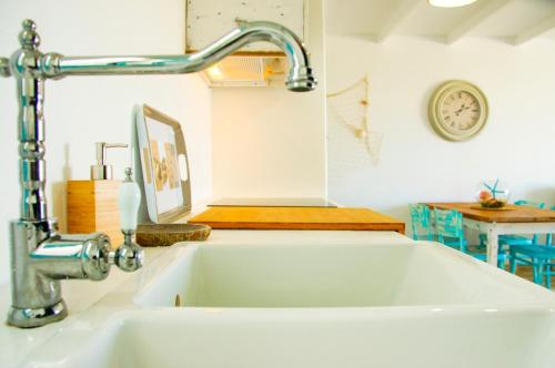 a kitchen sink with a faucet above it at Casa Ada 2 in Famara