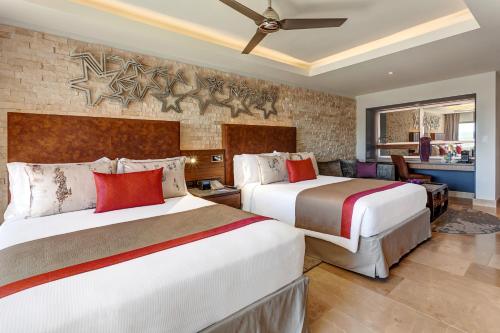 Voodi või voodid majutusasutuse Planet Hollywood Costa Rica by Royalton, An Autograph Collection All-Inclusive Resort toas