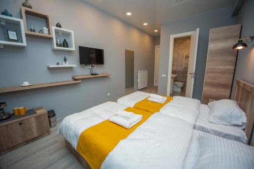 Postel nebo postele na pokoji v ubytování Easy Hotel T'bilisi