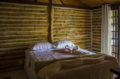 Una cama o camas en una habitación de Mar da Lua