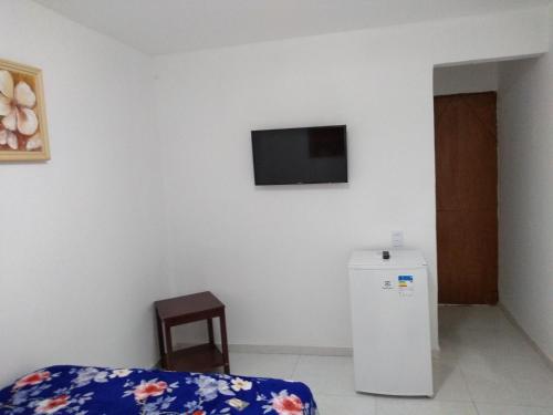TV a/nebo společenská místnost v ubytování Pousada Praia Bela Maceió