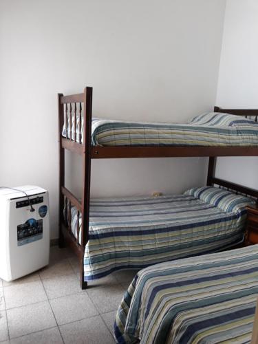 Tempat tidur susun dalam kamar di Departamento Catamarca