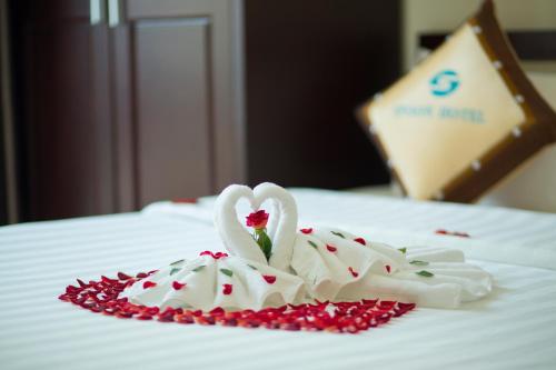 Postel nebo postele na pokoji v ubytování Spoon Hotel