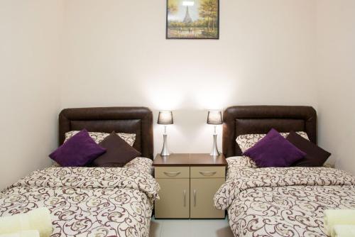 Guest House Centar luxにあるベッド