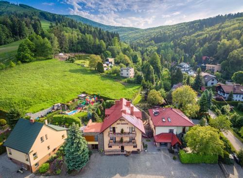 an aerial view of a house with a yard at Willa pod Czantorią SPA Ustroń in Ustroń