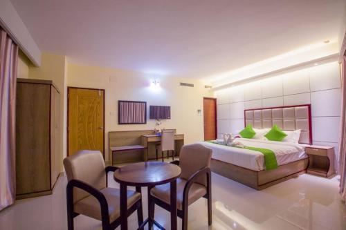 Postel nebo postele na pokoji v ubytování Hotel Mira Garden