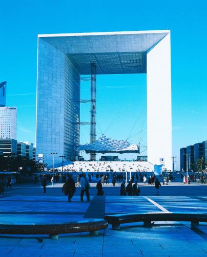 a large building with people walking in front of it at ibis Paris La Defense Courbevoie in Courbevoie