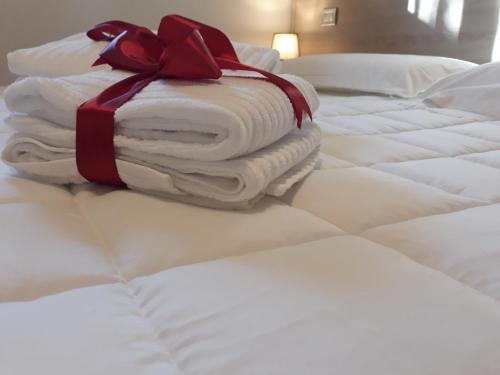 Een bed of bedden in een kamer bij Cuoreverde Matera