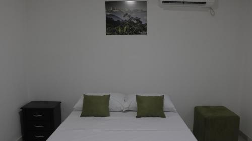 Postel nebo postele na pokoji v ubytování Puerto Caribe Hostal