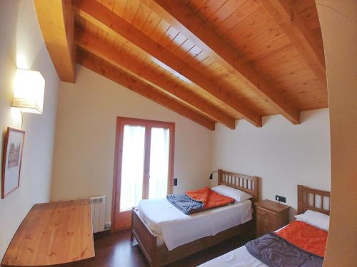 Cama o camas de una habitación en Casa PereCampelles - Vall de Núria - Ripollès