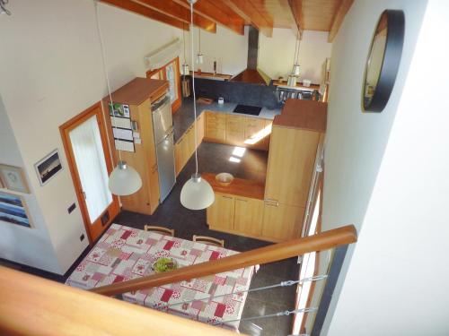 an overhead view of a kitchen and living room at Casa PereCampelles - Vall de Núria - Ripollès in Campelles